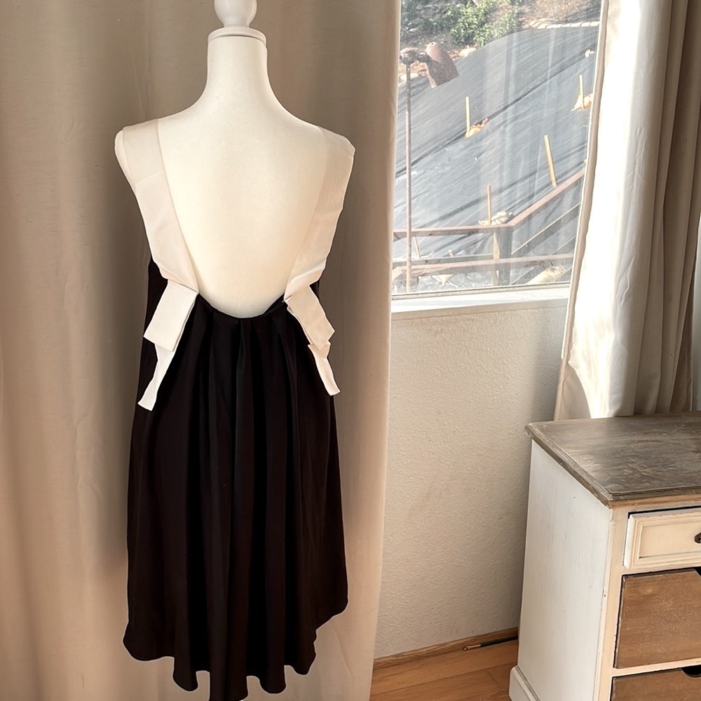 Claudie Pierlot, French, Silkie feel NWOT Size 4 low back. Ribbon straps.